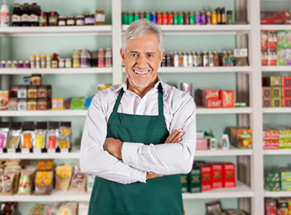 Confident business owner in their shop